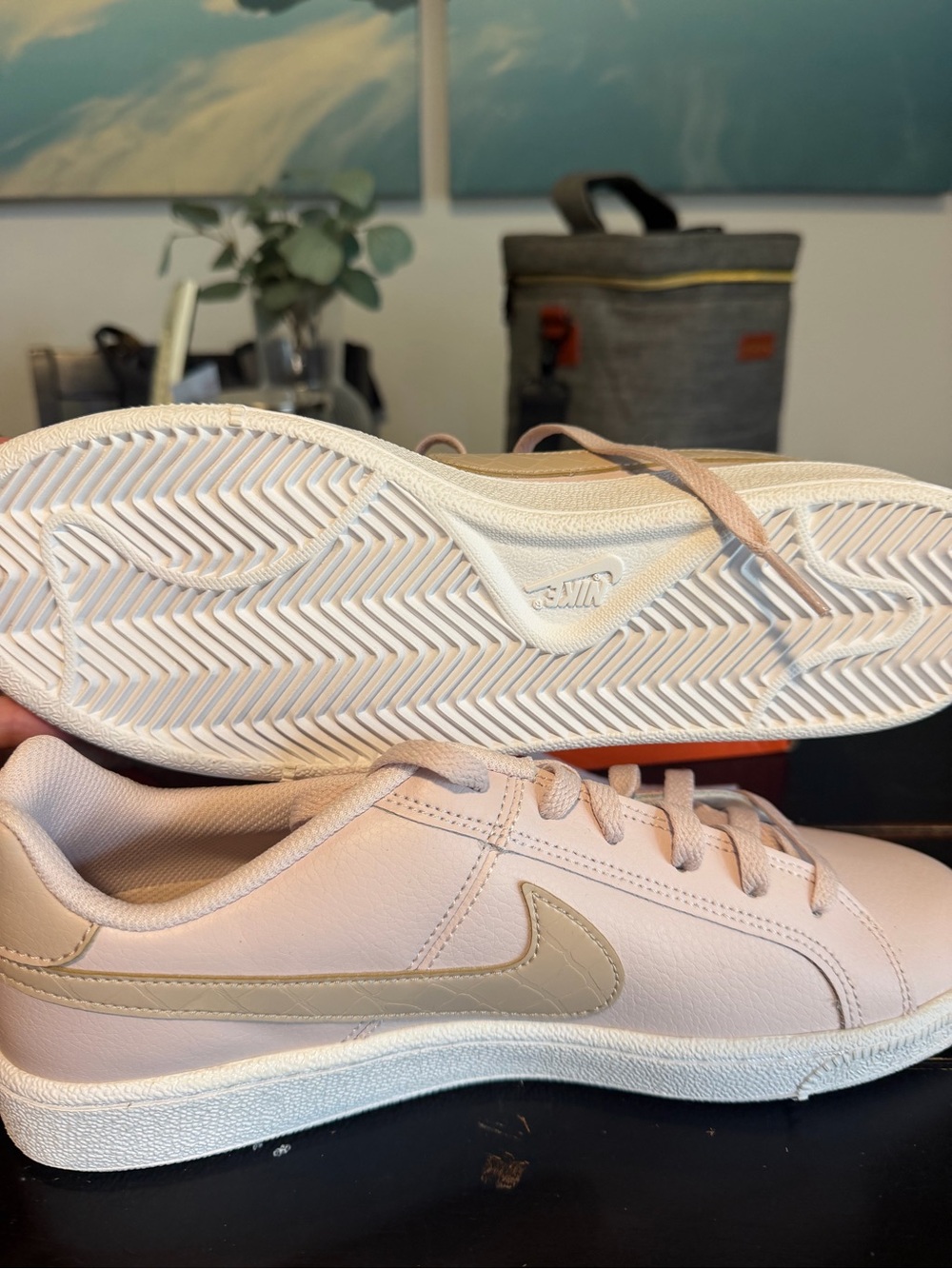 Nike Women’s Light Pink Leather Sneakers with Cream Swoosh